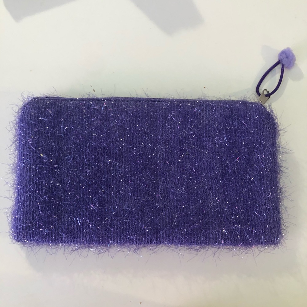 purple fuzzy pouch